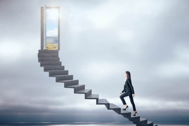 Businesswoman walking on ladder to success sky background.